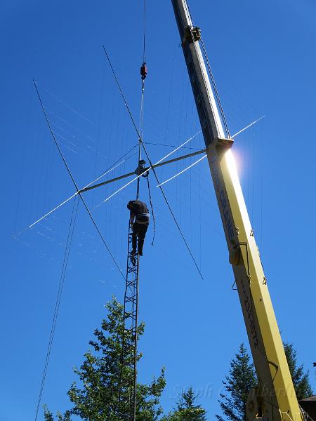 IMG_0666.JPG - Working on aiming the antenna north.